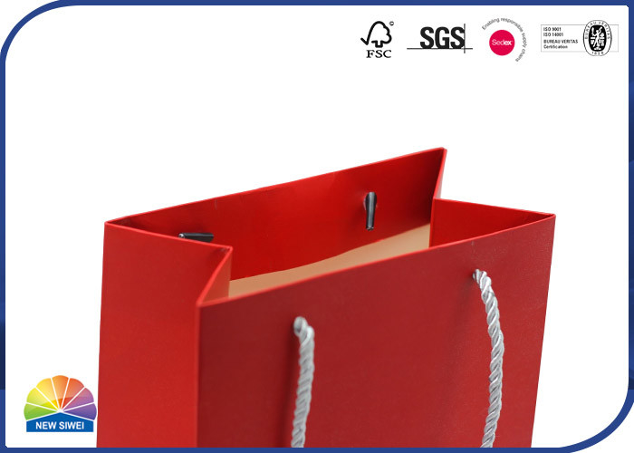 Cópia luxuosa 250gsm Art Paper Shopping Bags Silver que carimba com os punhos de nylon da corda