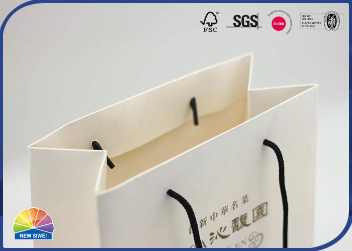 Saco de papel feito sob encomenda do presente do boutique de Logo Paper Shopping Bags Luxury com punho
